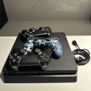 Gaming Console with Dual Controllers - Black and Blue Camouflage